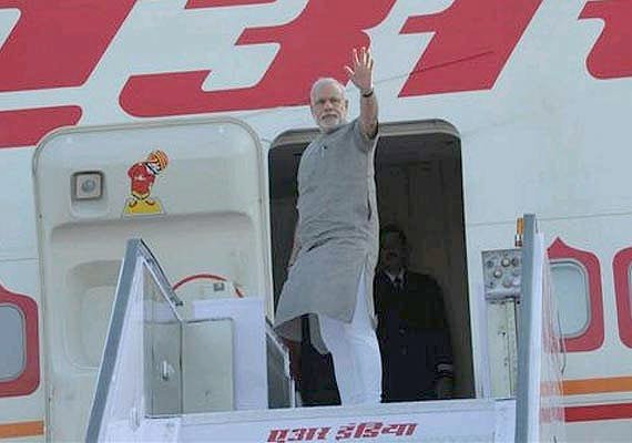 Modi travels back to India with $19.78 Billion!