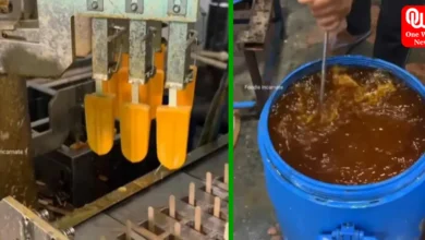 This is how orange popsicles are made in a factory